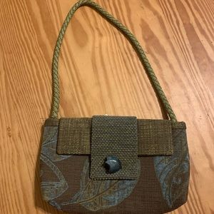 Green hand bag with snap, turquoise bead.